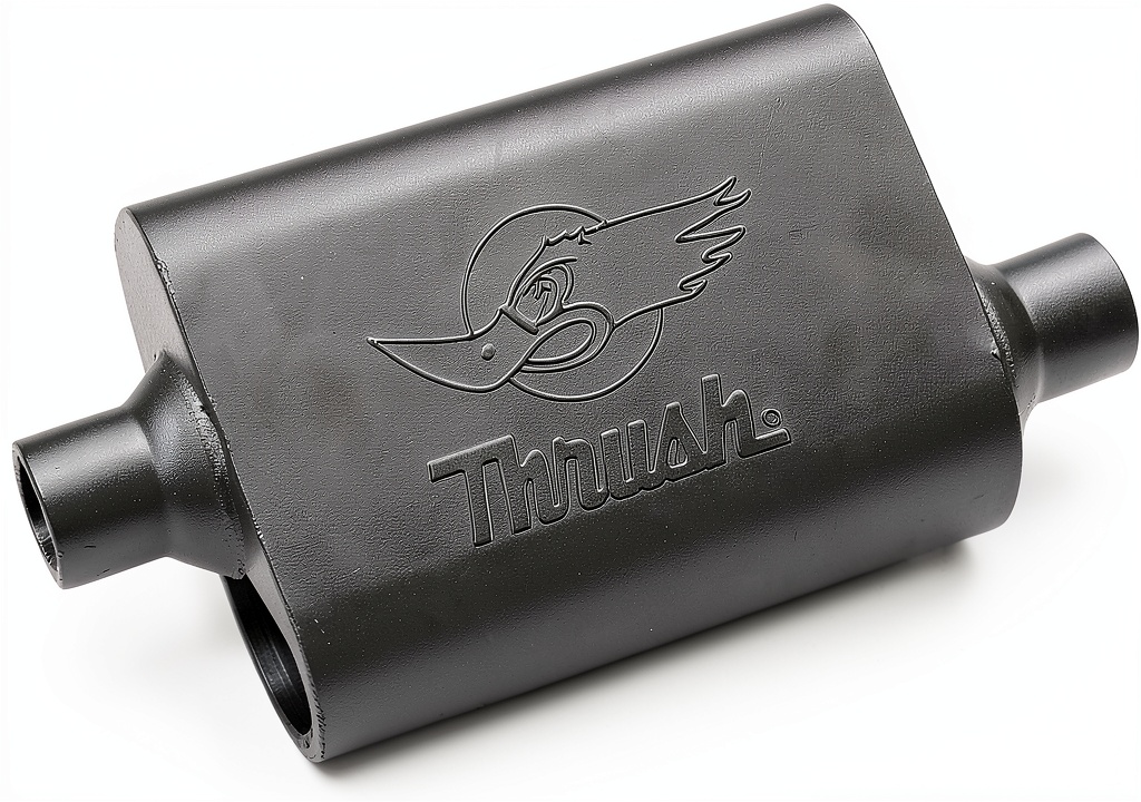Installing Thrush Oval Exhaust Muffler 17651 Aggressive Sound Alloy Steel on a wooden workbench